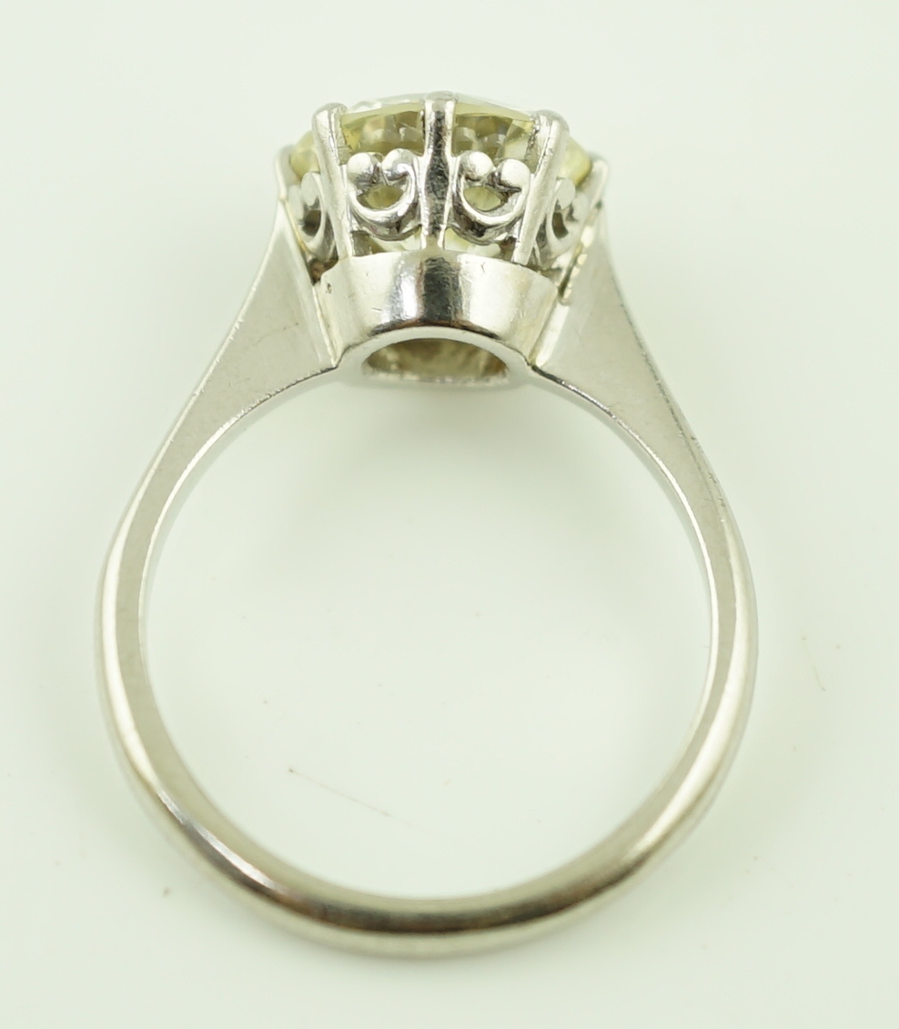 A platinum and solitaire diamond set ring